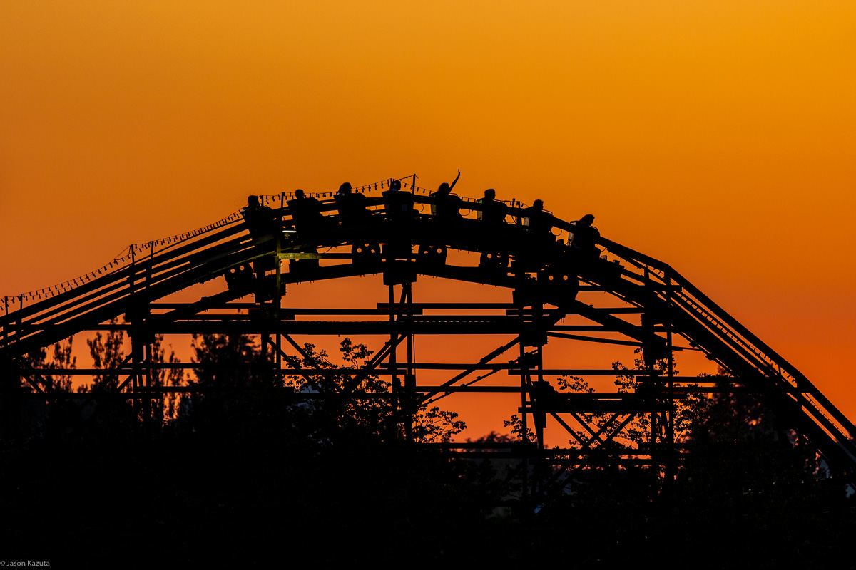 Playland wooden roller coaster at sunset